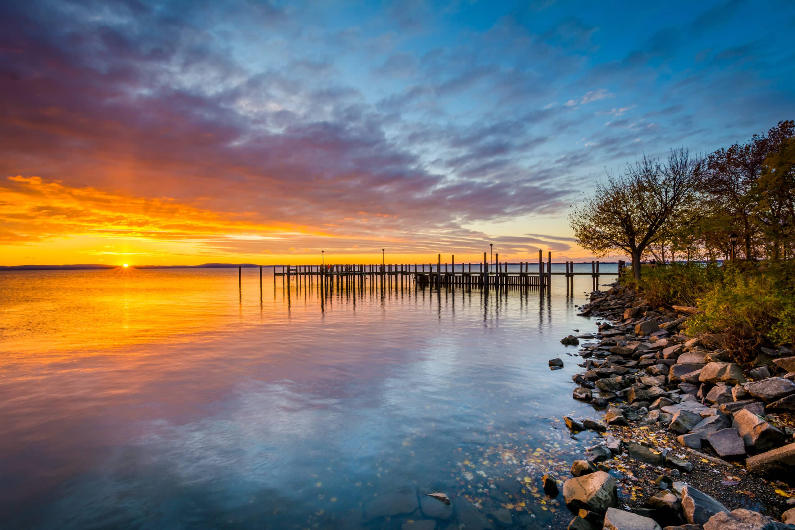 Sunrise over dock and the Chesapeake Bay, in Havre de Grace, Maryland