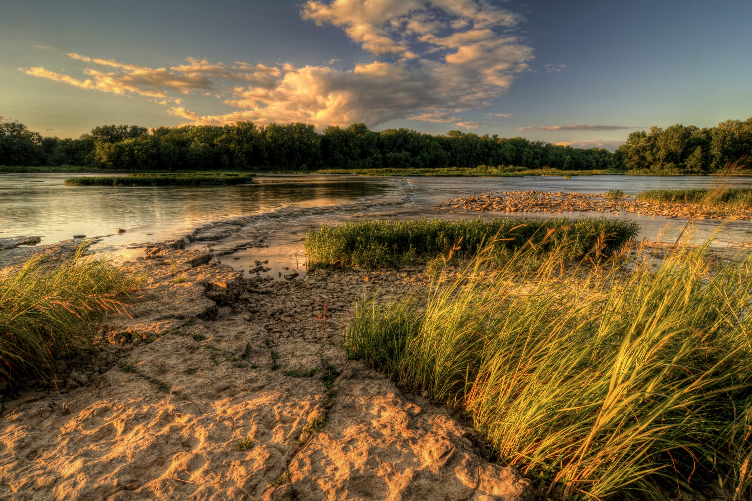 A beautiful warm summer sunset at Weir's Rapids on the Maumee river in northwest Ohio